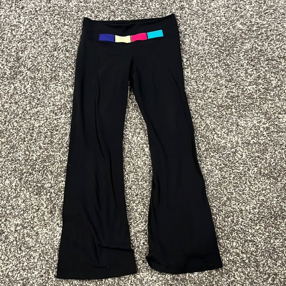 lululemon athletica Pants - Flared lululemon leggings, reversible to solid black
